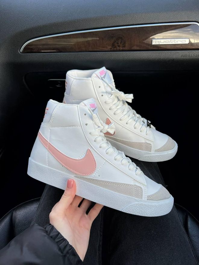 pink and white nike high tops