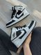 Баскетбольні кросівки Nike Air Jordan 1 Mid Black White 1143 фото 1