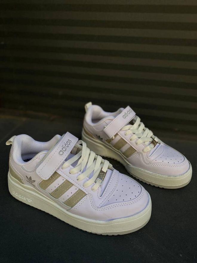 beige and white adidas