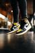 Баскетбольные кроссовки Nike Air Jordan 1 Retro Mid Black Yellow White 2021 фото 2