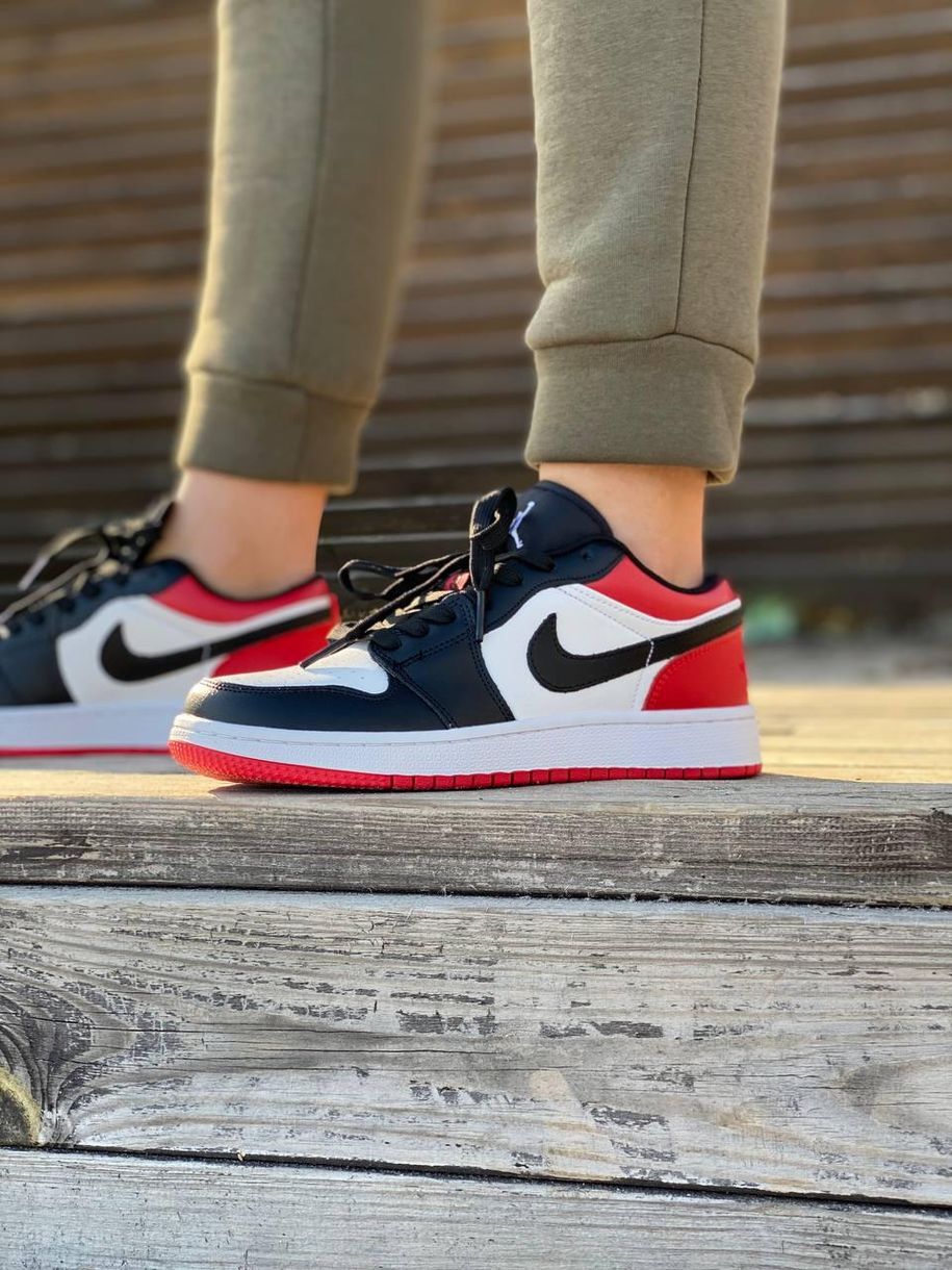 red and black nike air jordans low top