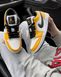Баскетбольные кроссовки Nike Air Jordan Retro 1 Low Yellow White Black 2125 фото 4